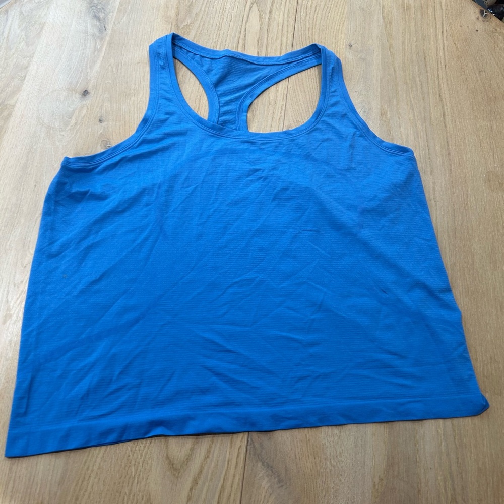 Blue lululemon swiftly tech top like new.